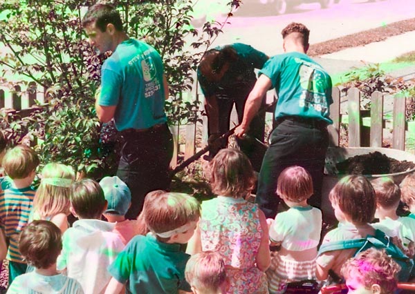 Shreiner Tree care performing a school tree planting in 1992