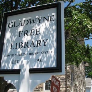 Tree service pruning trees around Gladwyne Free Library