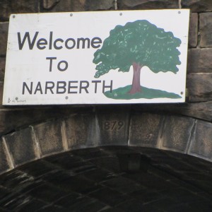 Welcome to Narberth sign with a tree on it